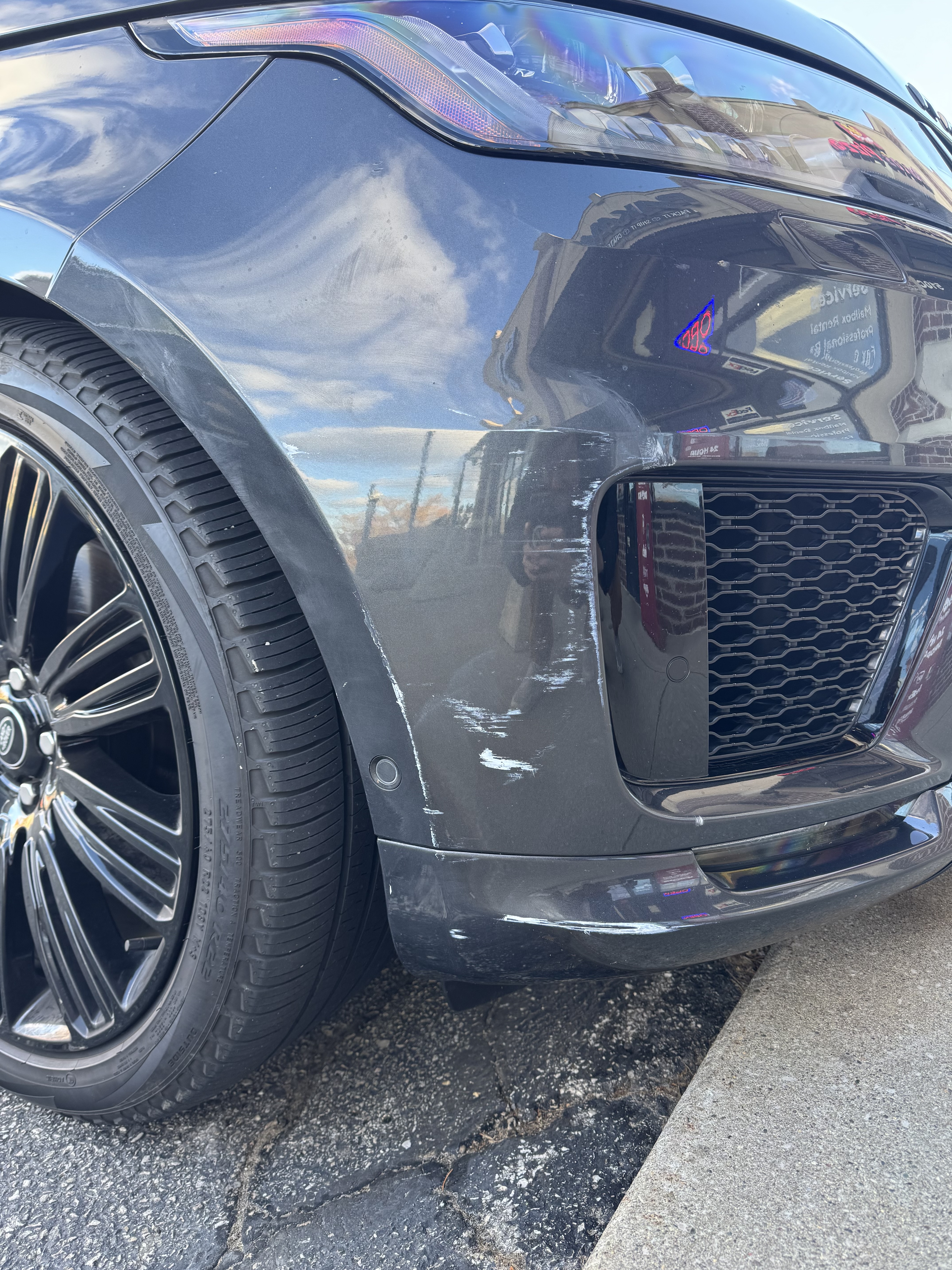 Front right headlight — heavily oxidized before restoration